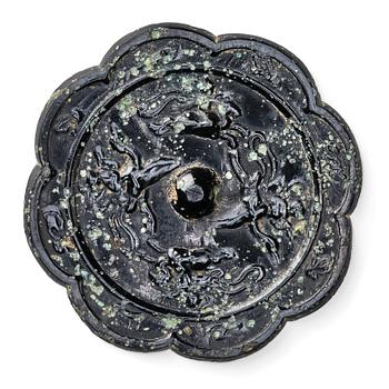 Eight-lobed bronze mirror with mythical animals, Tang dynasty (618–907).