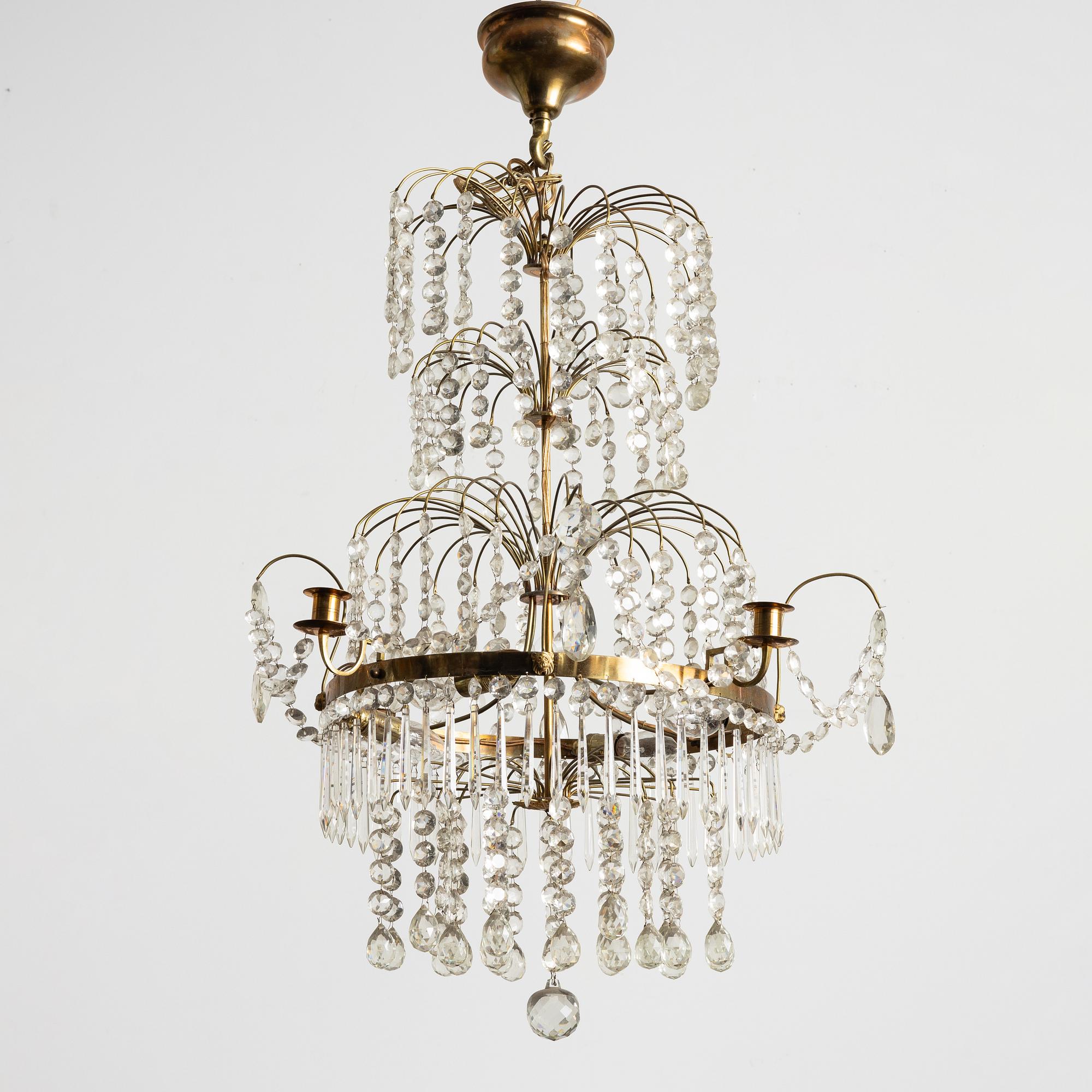 A four-light Gustavian-style chandelier, circa 1900.
