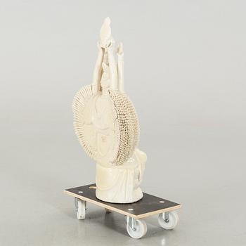 A porcelain figurin, late 20th century,