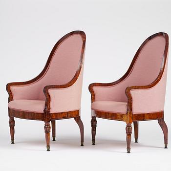 A pair of Baltic mahogany fauteuils, mid 19th century.