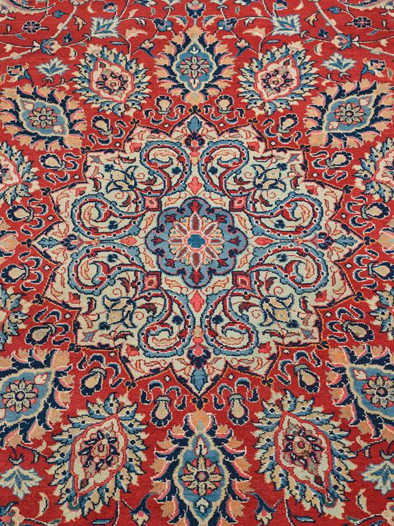 A carpet, a semi-antique/an old Persian, probably a Qazvin, ca 345-349 x 251,5-253 cm.