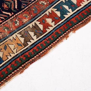 A antique Kazak gallery carpet, ca 310 x 105 cm.