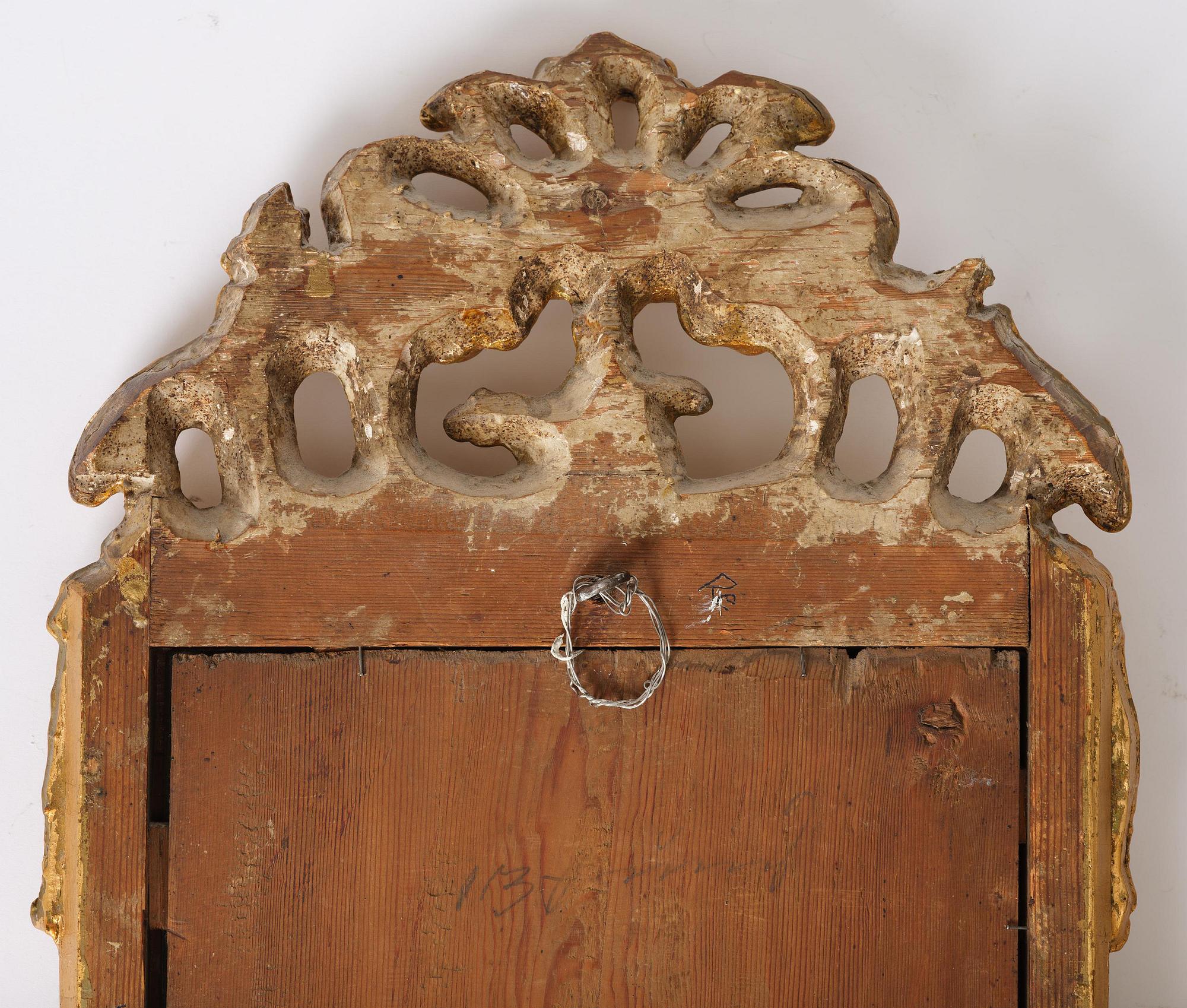 A rococo giltwood mirror by N. Meunier (master i Stockholm 1754-97).