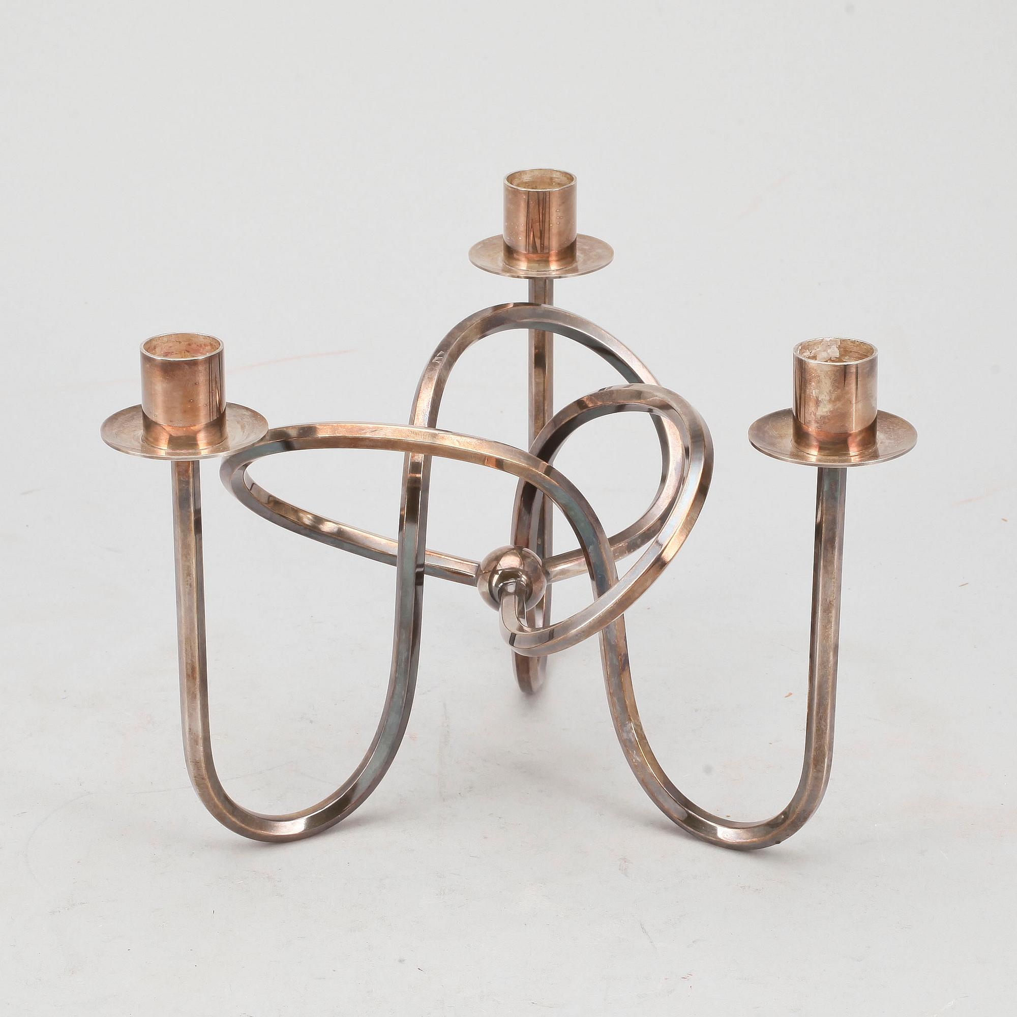 LJUSSTAKE, försilvrad mässing, "Vänskapsknuten", Josef Frank för Svenskt Tenn, formgiven 1938.