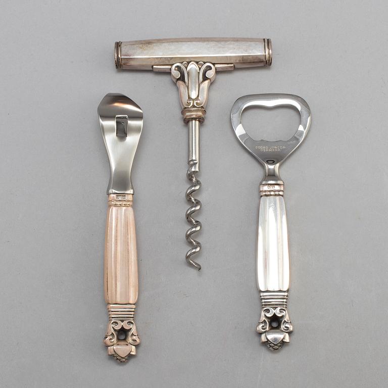 A Danish 20th century set of three Georg Jensen silver openers.