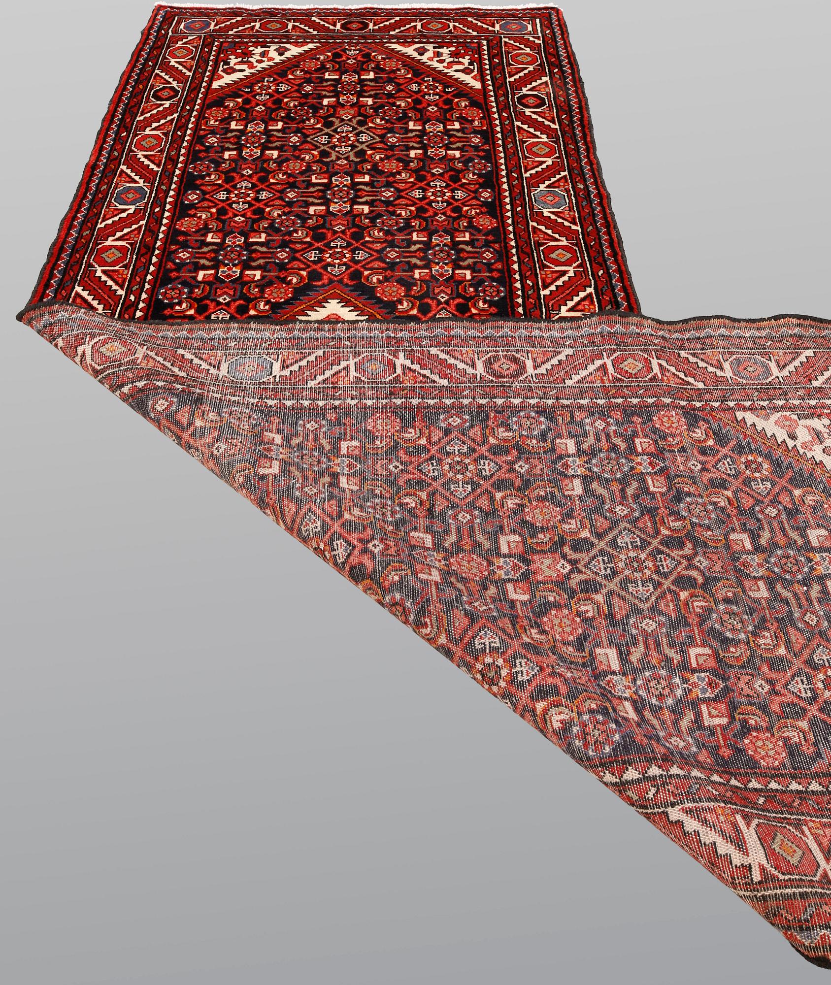 A pictoral Hamadan runner, ca 310 x 115 cm.