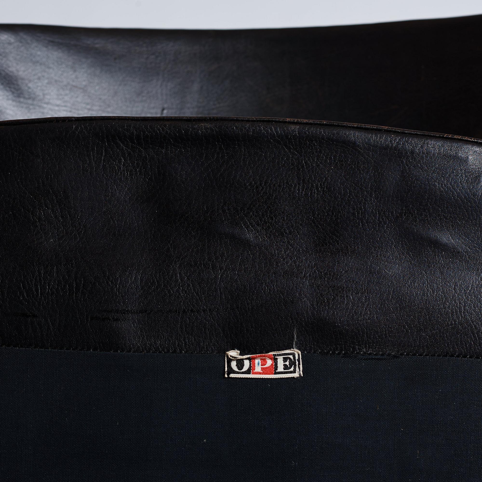 Ib Kofod-Larsen, a pair of black leather 'Sälen' easy chairs, Olof Perssons Fåtöljindustri (OPE), Sweden 1950s-60s.