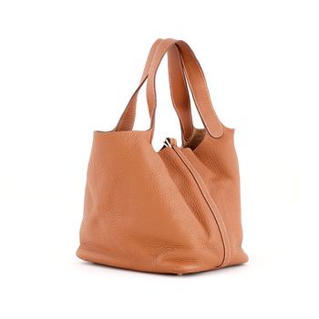 HERMÈS, a étoupe leather bag, "Picotin Lock".