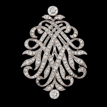 1404. A brilliant cut diamond pendant/brooch.