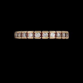 ALLIANSRING, 14k guld med 10 briljantslipade diamanter, totalt 0.60 ct, utländska stämplar. Vikt 4 g.