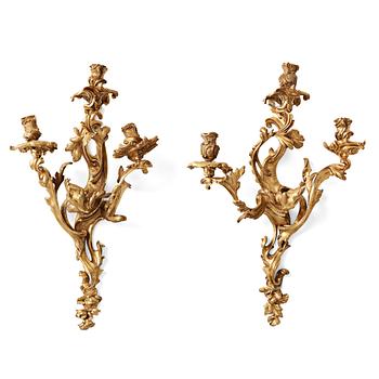 87. A pair of Louis XV mid 18th century three-light wall-lights.