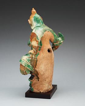 A gren and yellow glazed roof tile figure, Ming dynasty.