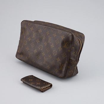 LOUIS VUITTON, a 'Trousse toilette 28' toilet bag and a key case.