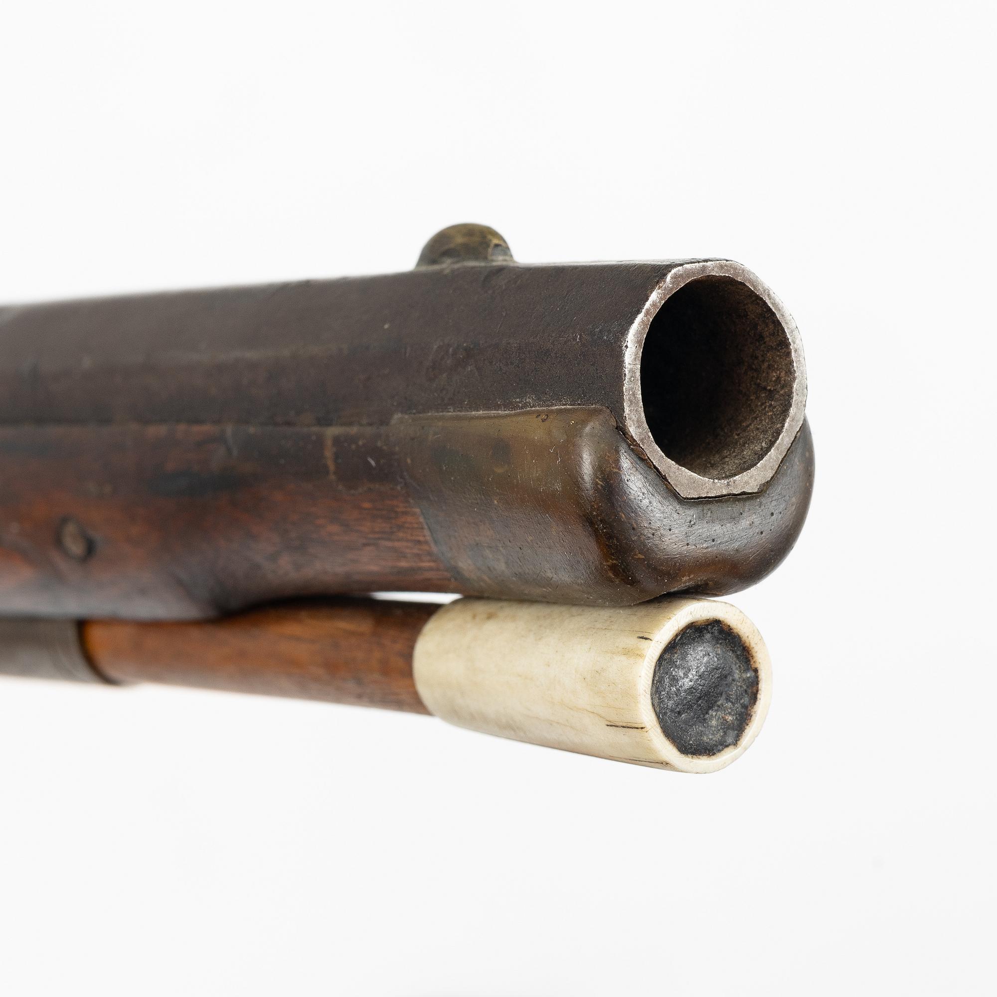 Percussion gun.