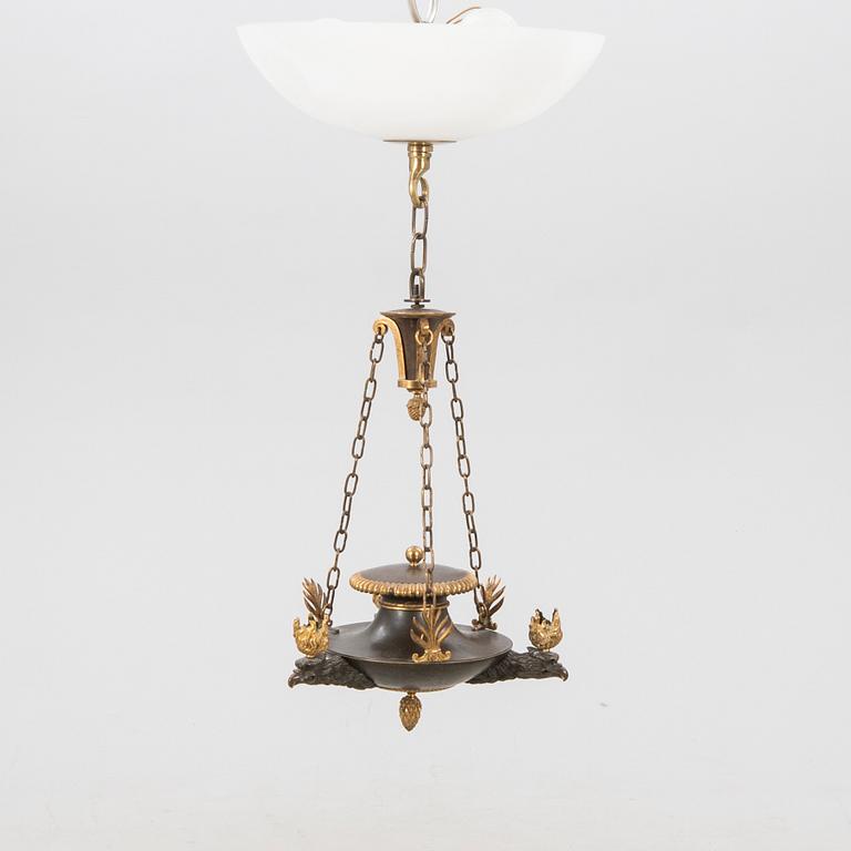 An Empire bronze chandelier.