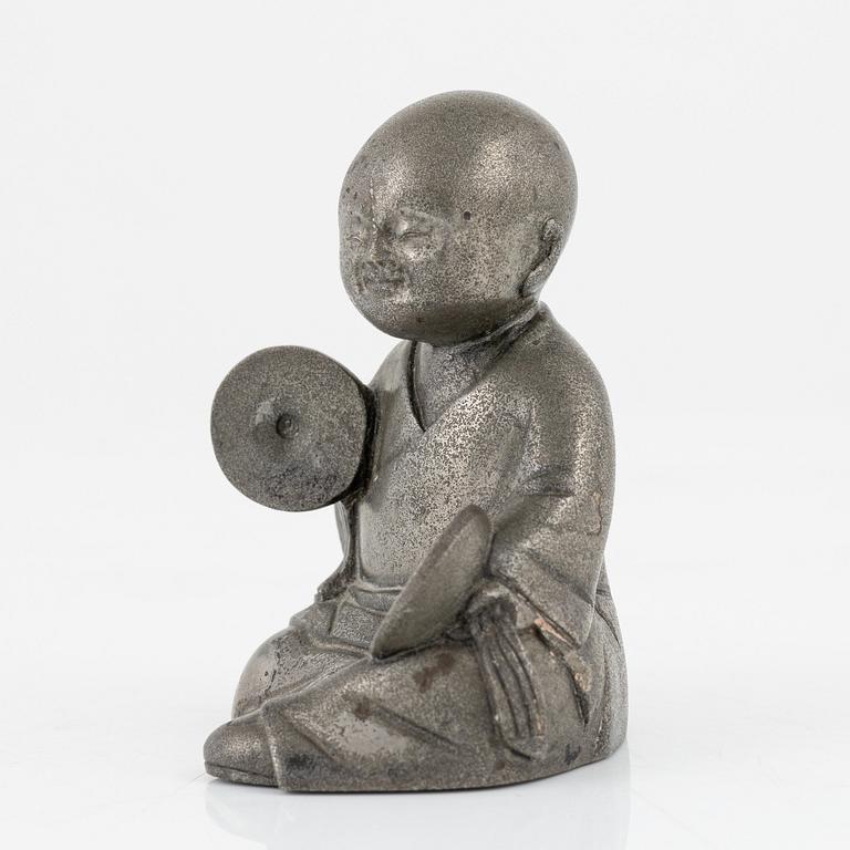 A pewter figurine, China, late Qign Dynasty, around 1900.