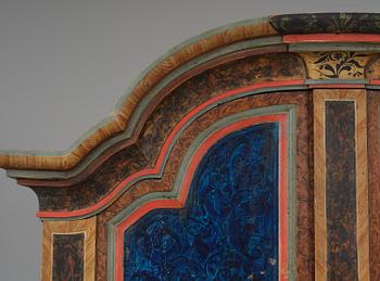 A polychrome-painted folk art cabinet from Värmland, Sweden, dated 1818.
