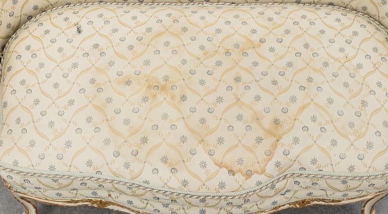 A Louis XV sofa.