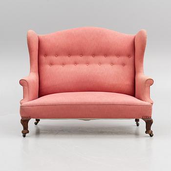 Sofa, circa 1900.