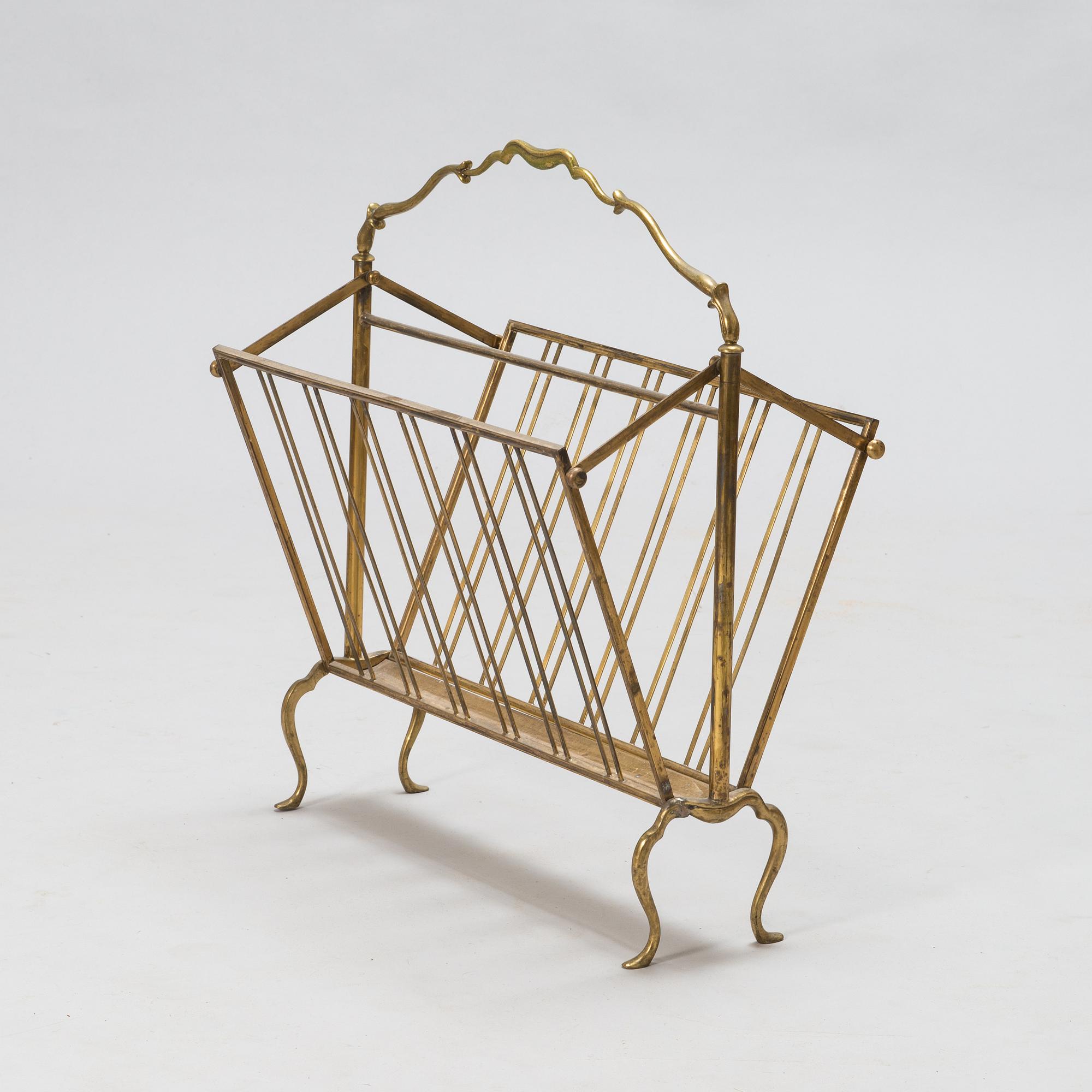 A folding brass magazine stand, first half of the 20th century.