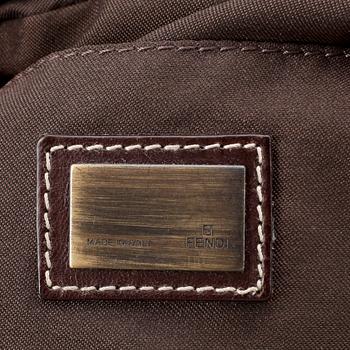 FENDI, a denim and brown leather shoulder bag.