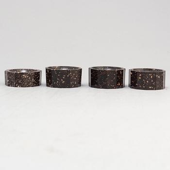 Three plus one porphyry salt cellars, Empire, second quarter of the 19th century.