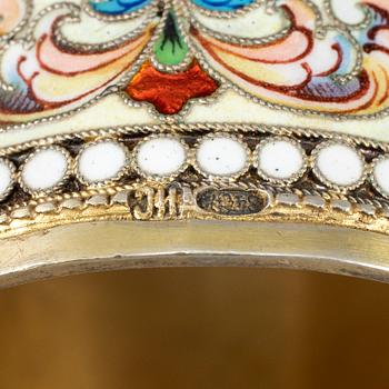 A Russian silver-gilt and cloisonné enamel napkin ring, unidentified makers mark, Moscow 1899-1908.