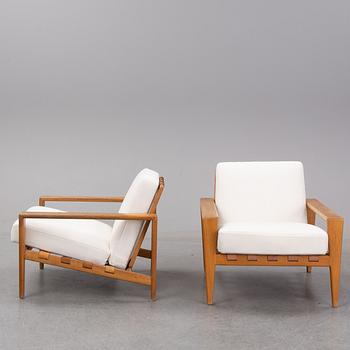 Svante Skogh, a pair of 'Bodö' oak easy chairs, AB Hjertquist & Co, Nässjö, designed in 1957.