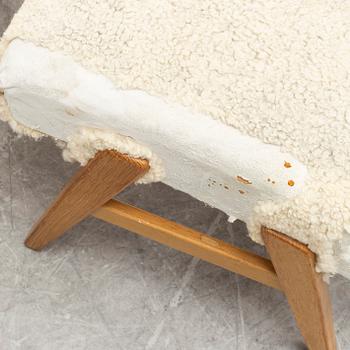 A 'Siesta' lounge chair and foot stool from JIO-möbler, 1960's.