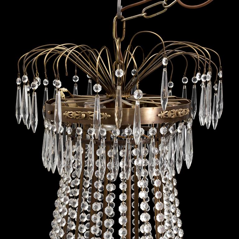 A CHANDELIER, Empire-style, second half of the 20th century.