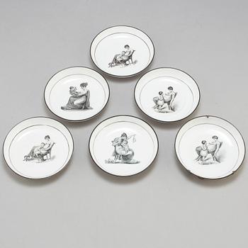 Six soft paste cups with saucers, early 19th century.