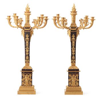56. A pair of Empire style circa 1900 six-light candelabra.
