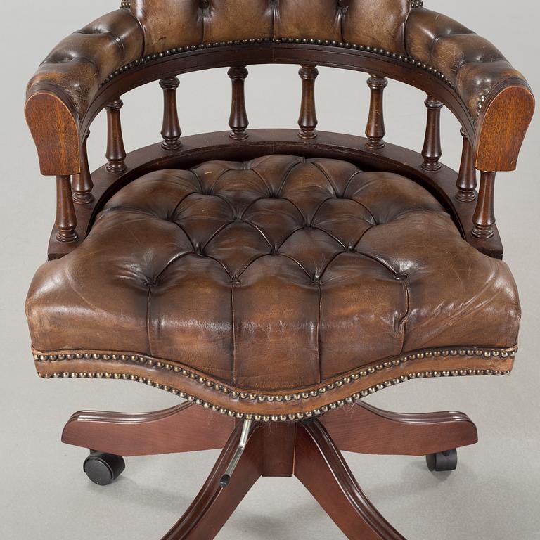 A desk chair in English style, made in the second half of the 20th century.