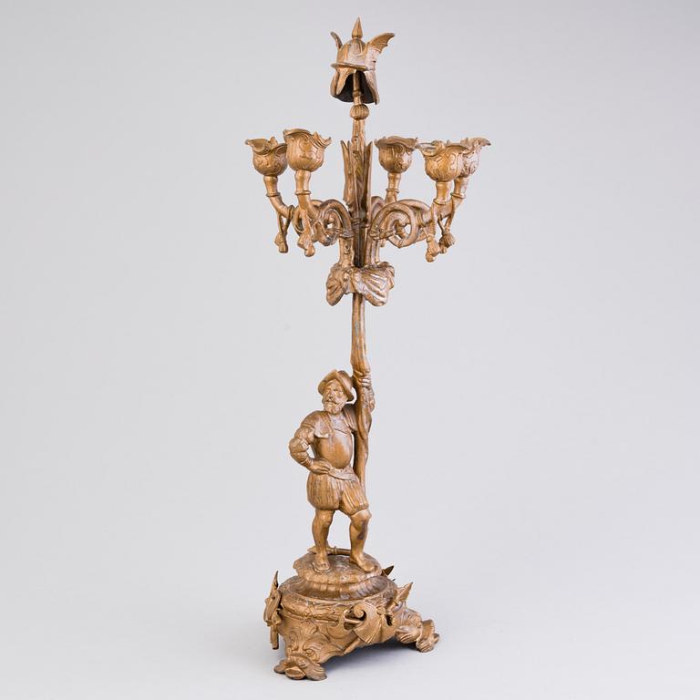 A candelabrum in copper metal alloy, end of the 19th Century.