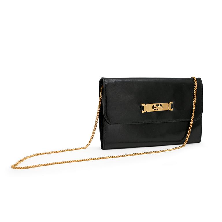 CÉLINE, a black leather evening bag.