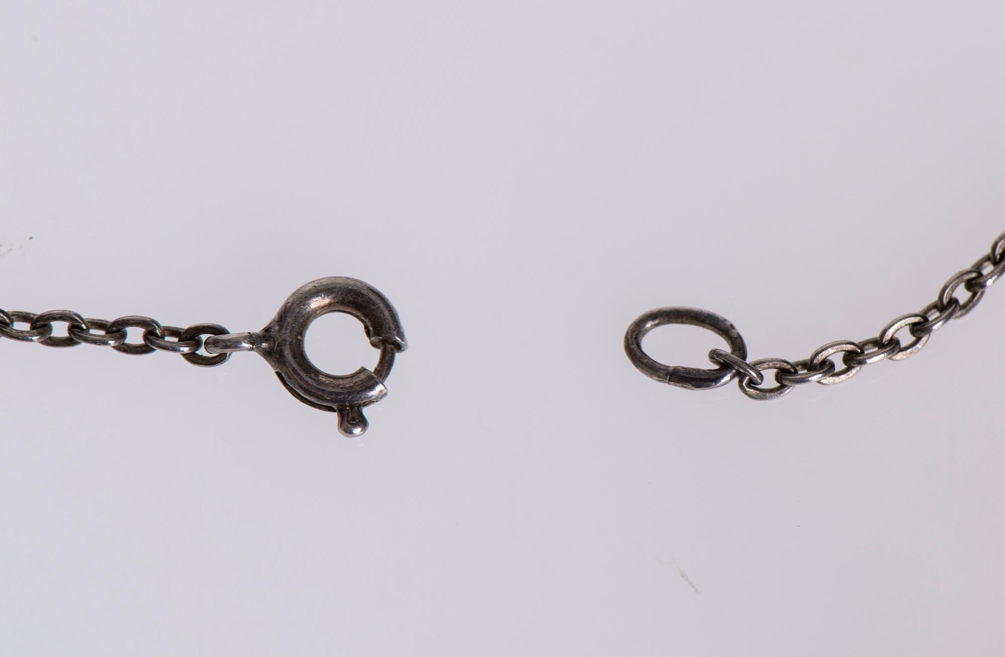 HÄNGE / BROSCH. Elis Kauppi, Kupittaan Kulta 1972, silver.