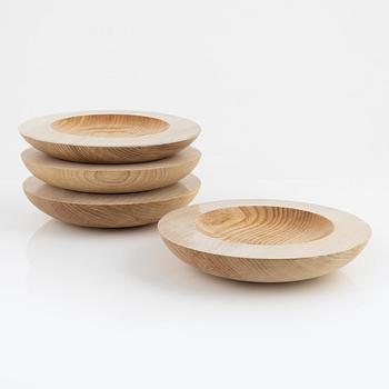 Magnus Ek, a set of four ash wood plates for Oaxen Krog, 2020.