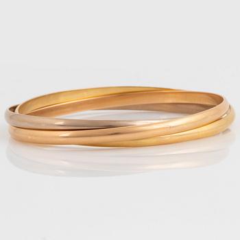 A Cartier "Trinity" bangle.