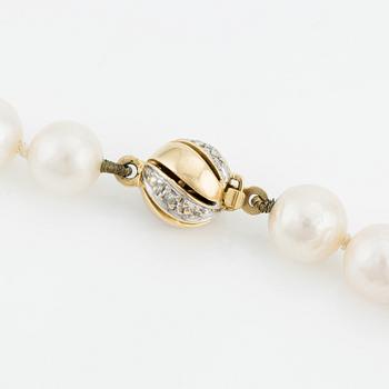 Necklace & bracelet, cultured pearls with 18K gold clasp and small diamonds.