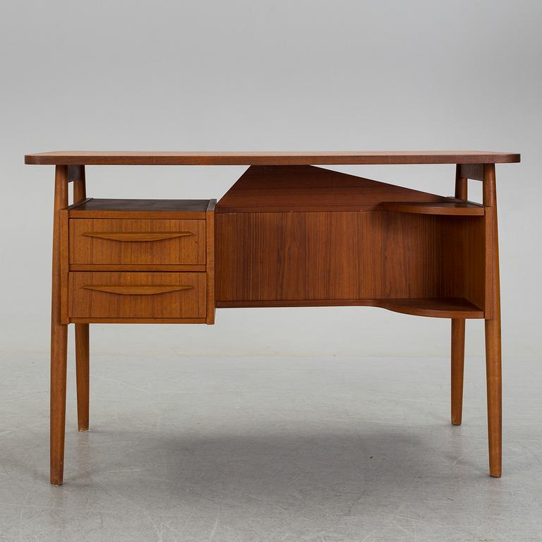 A mid 20th century writing desk from Tibergaard Denmark.