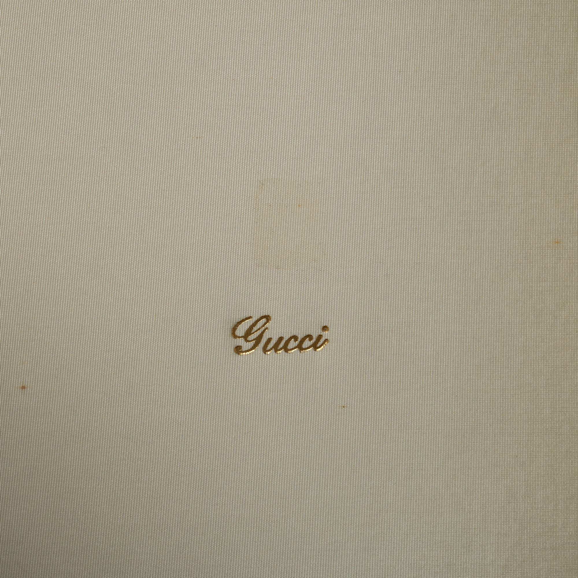 Gucci, A set of six vintage christmas mugs.