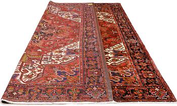 A Heriz carpet, c 338 x 273.