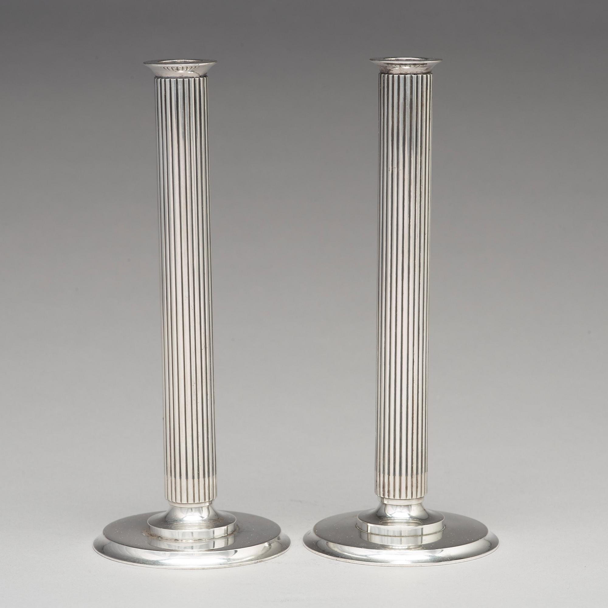 Sigvard Bernadotte, a pair of sterling silver candlesticks, Georg Jensen, Copenhagen 1945-77, design nr 855B.