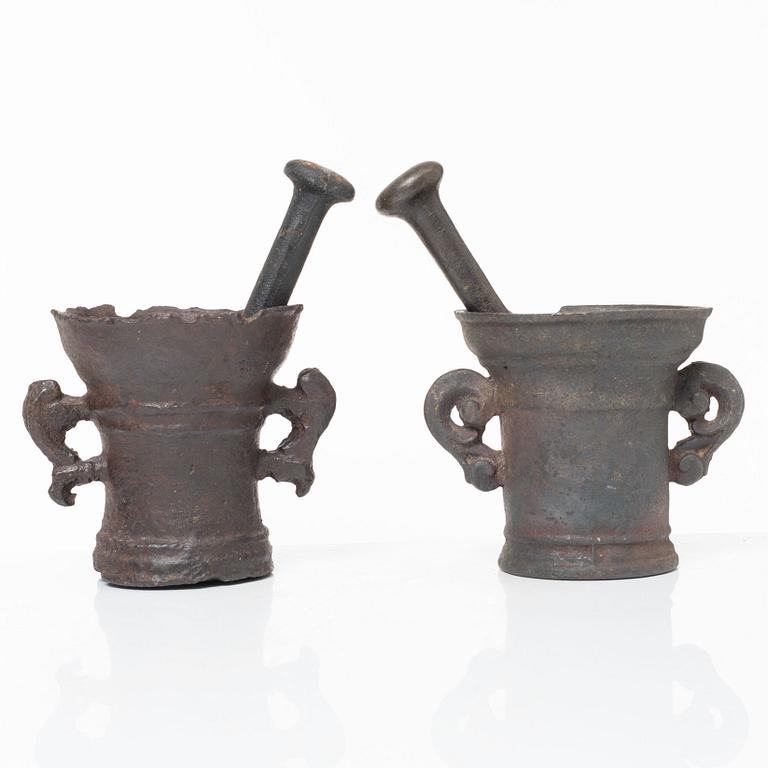 A set of two renaissance-type cast-iron mortars, 17th century.