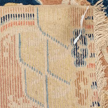 A PILLAR CARPET, an antique Ningxia figural, China late Qing, ca 304 x 130-170 cm.