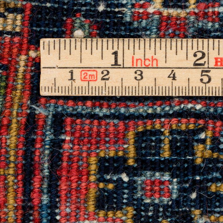 A semi-antique Sarouk, aroud 330 x 224 cm.