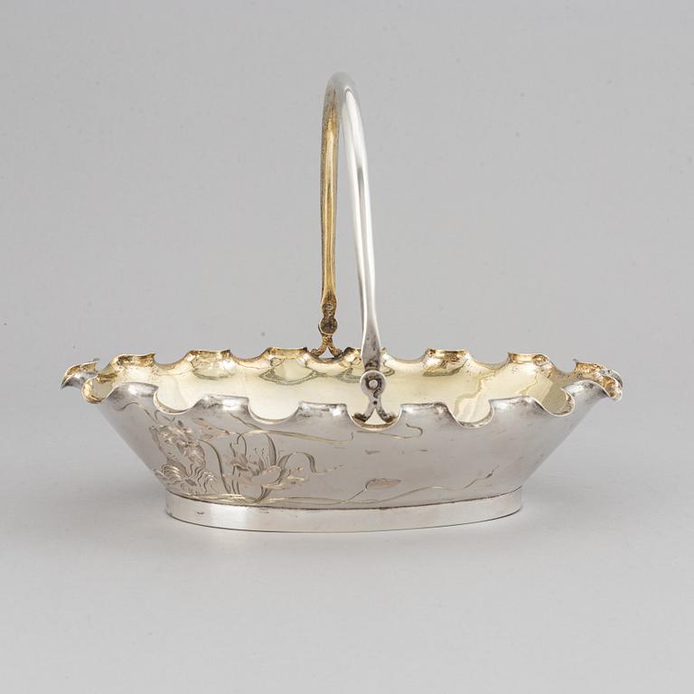A Russian early 20th century parcel-gilt silver basket, unidentified makers mark, Moscow 1899-1908.