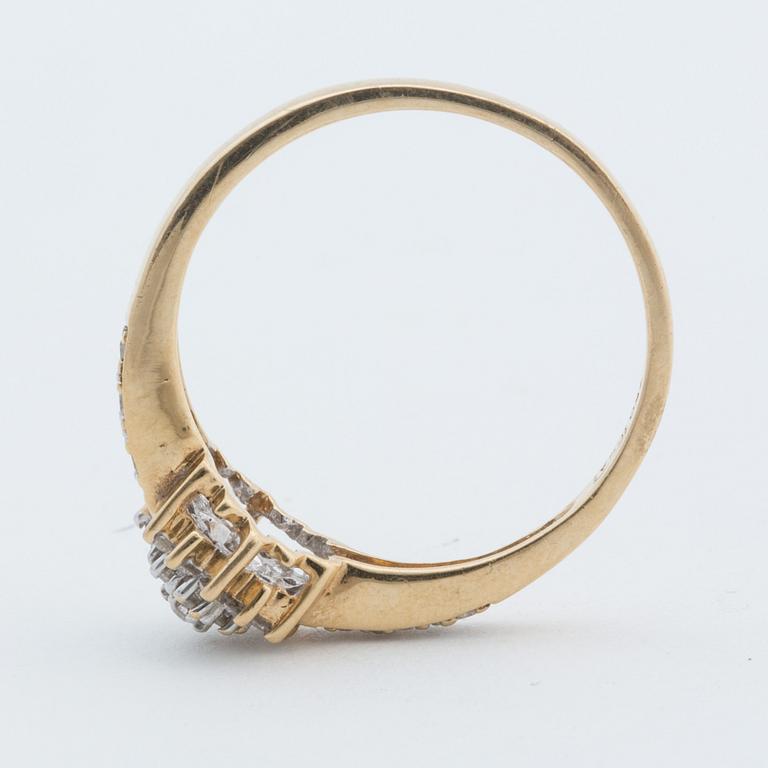 A 18K gold ring with diamonds,