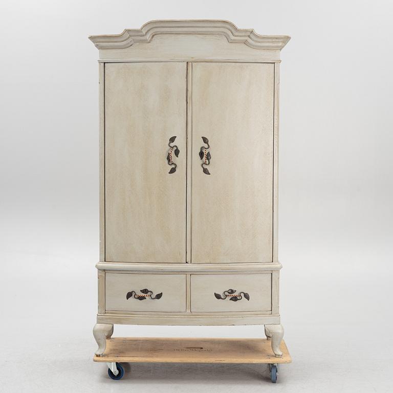 A cabinet, early 20th Century.