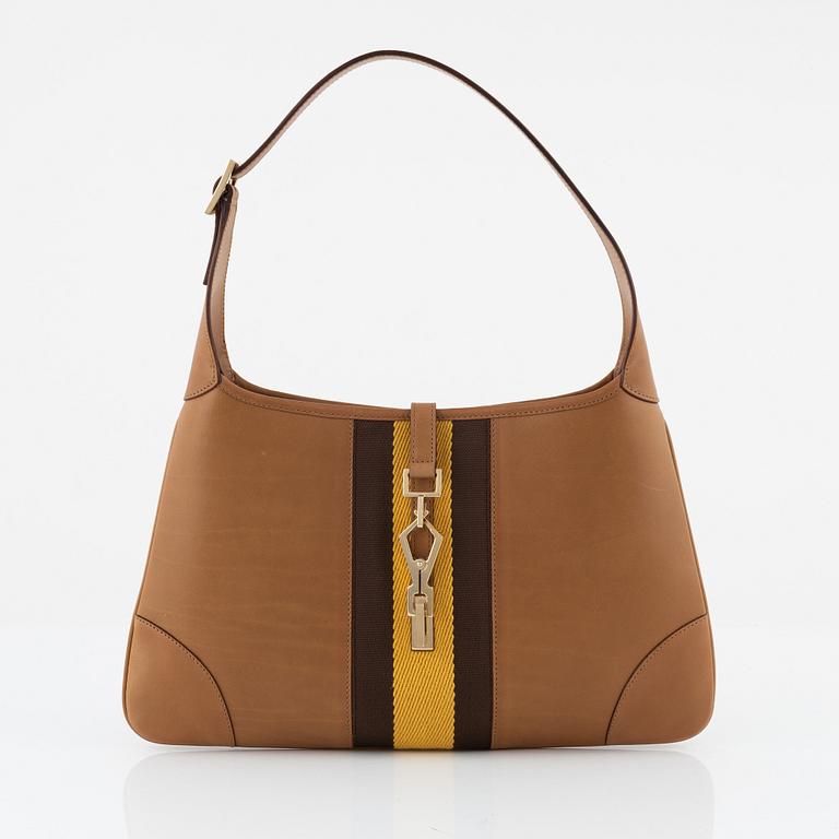 Gucci, a 'Jackie' leather handbag.